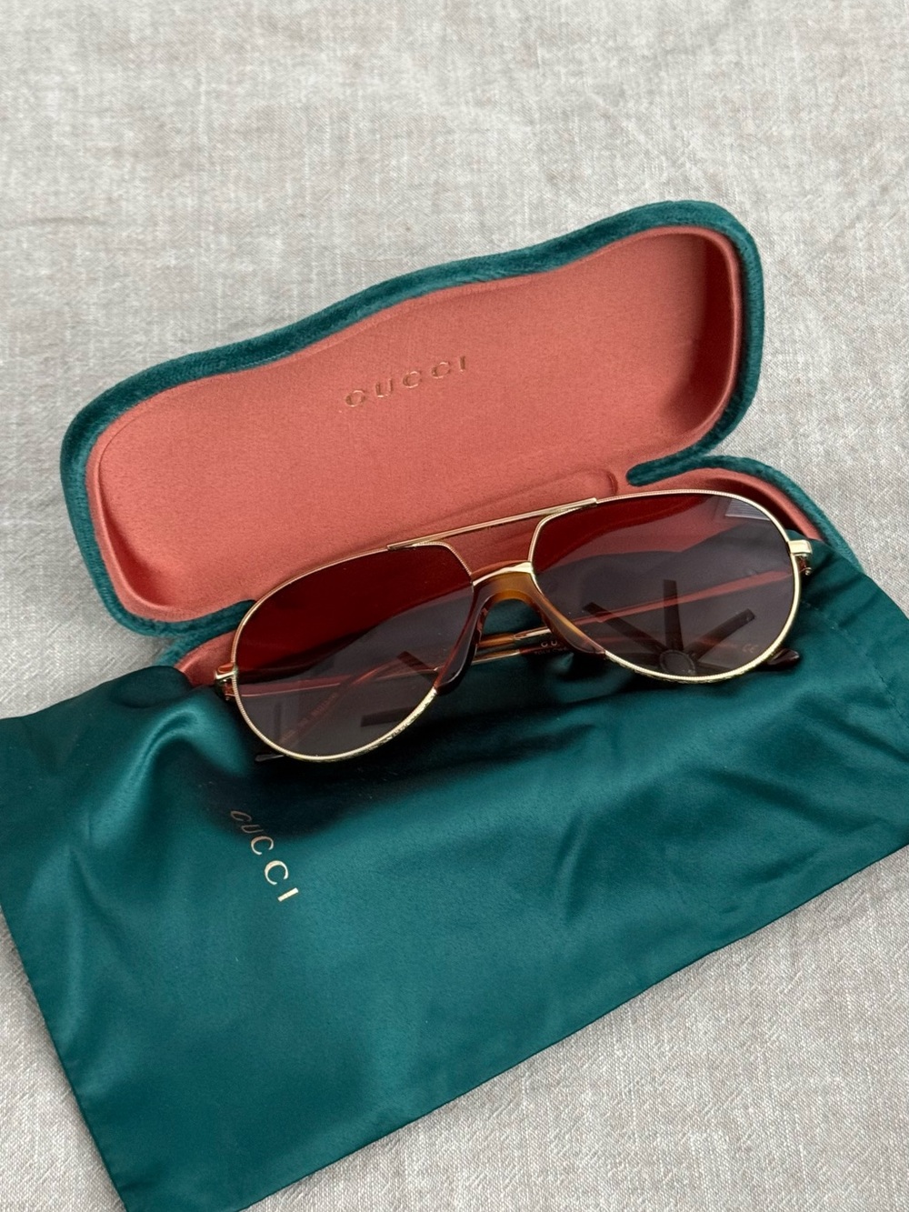 Gucci Gold Frame Sunglasses with Burgundy Lenses